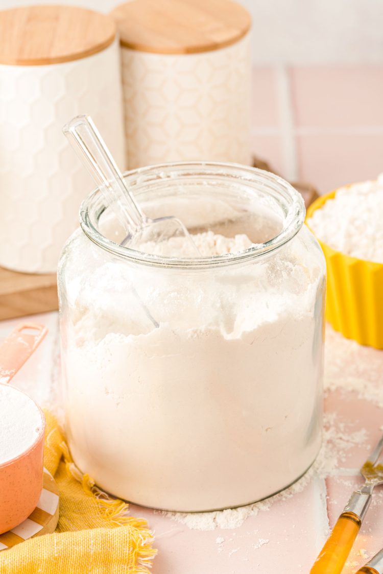 Flour in a big glass container.