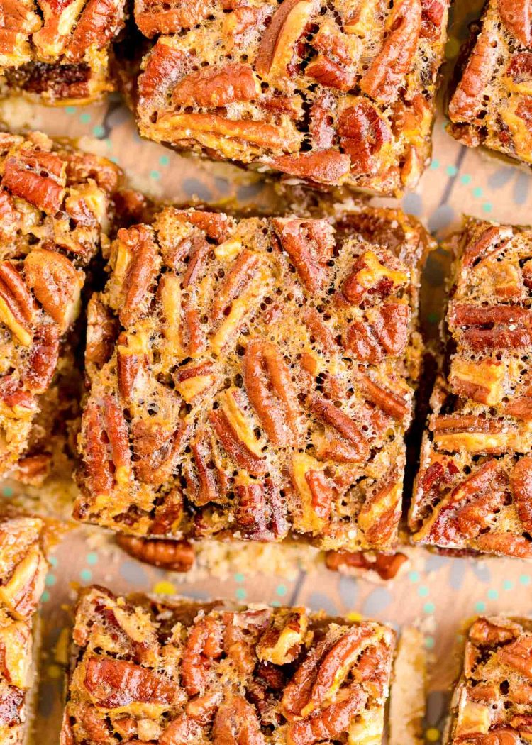 Close up overhead photo of sliced pecan squares.