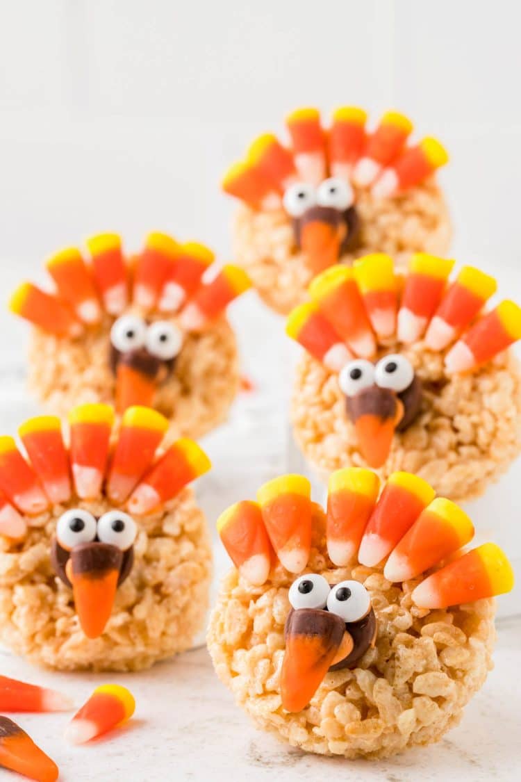 Thanksgiving Turkey decorated rice krispie treats on a marble surface. 