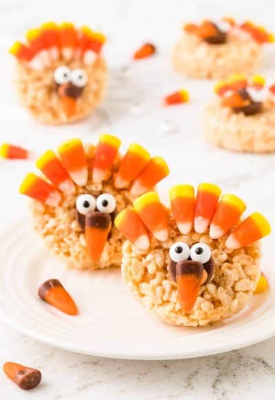 Thanksgiving turkey rice krispie treats on a white plate.