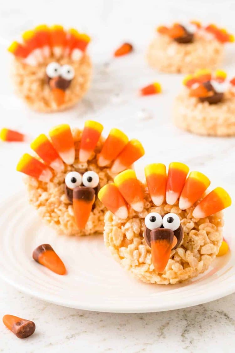 Thanksgiving turkey rice krispie treats on a white plate.