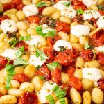 baked gnocchi on a roasted pan.