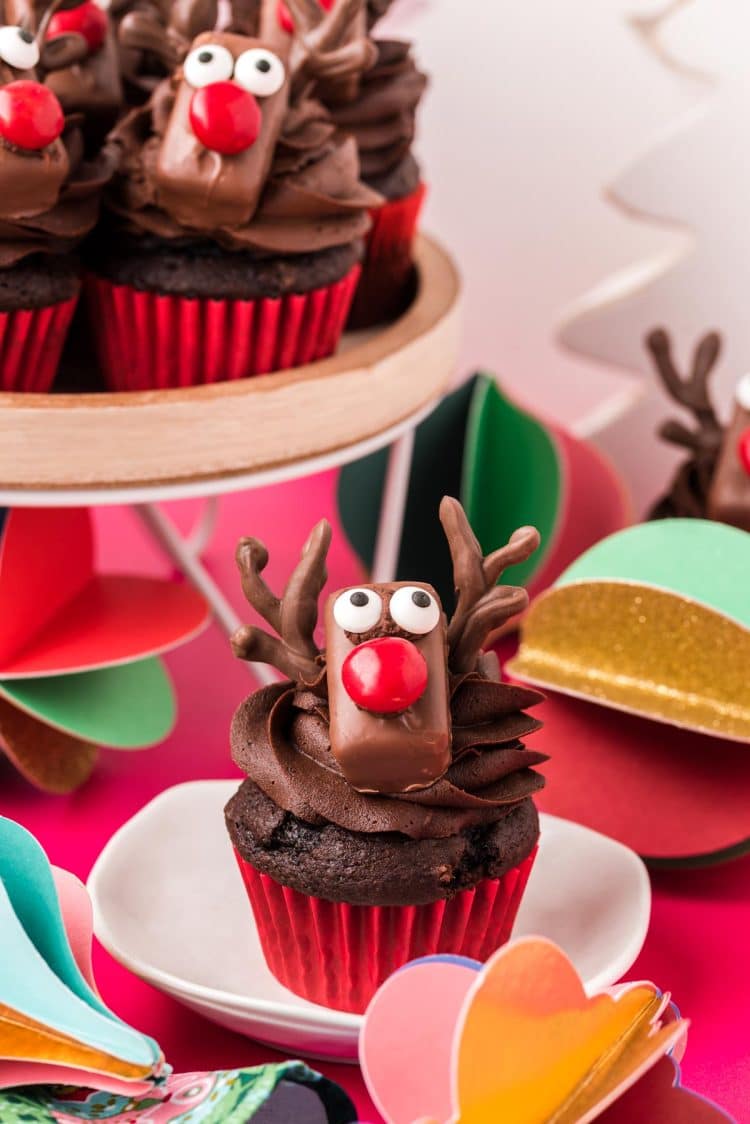 Reindeer cupcake on a white plate.