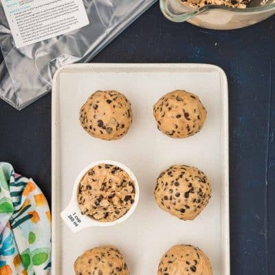 Cookie dough portioned out onto a baking sheet ready to flash freeze.