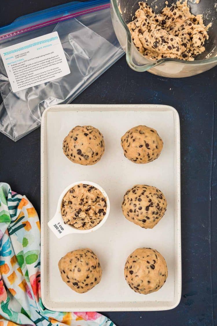 Cookie dough portioned out onto a baking sheet ready to flash freeze.