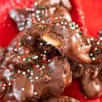 Turtle crockpot candy piled on a red napkin.