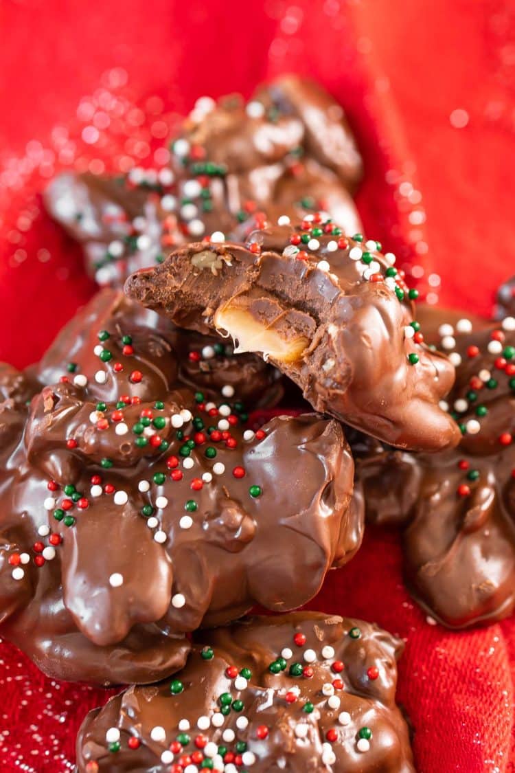 Turtle crockpot candy piled on a red napkin.