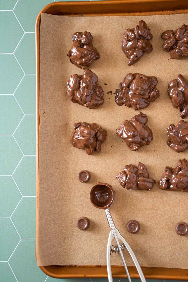 Trutle crockpot candy being made on a baking tray.