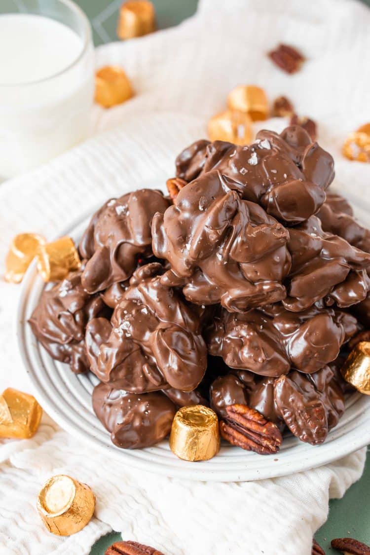 Turtle candies on a white plate.