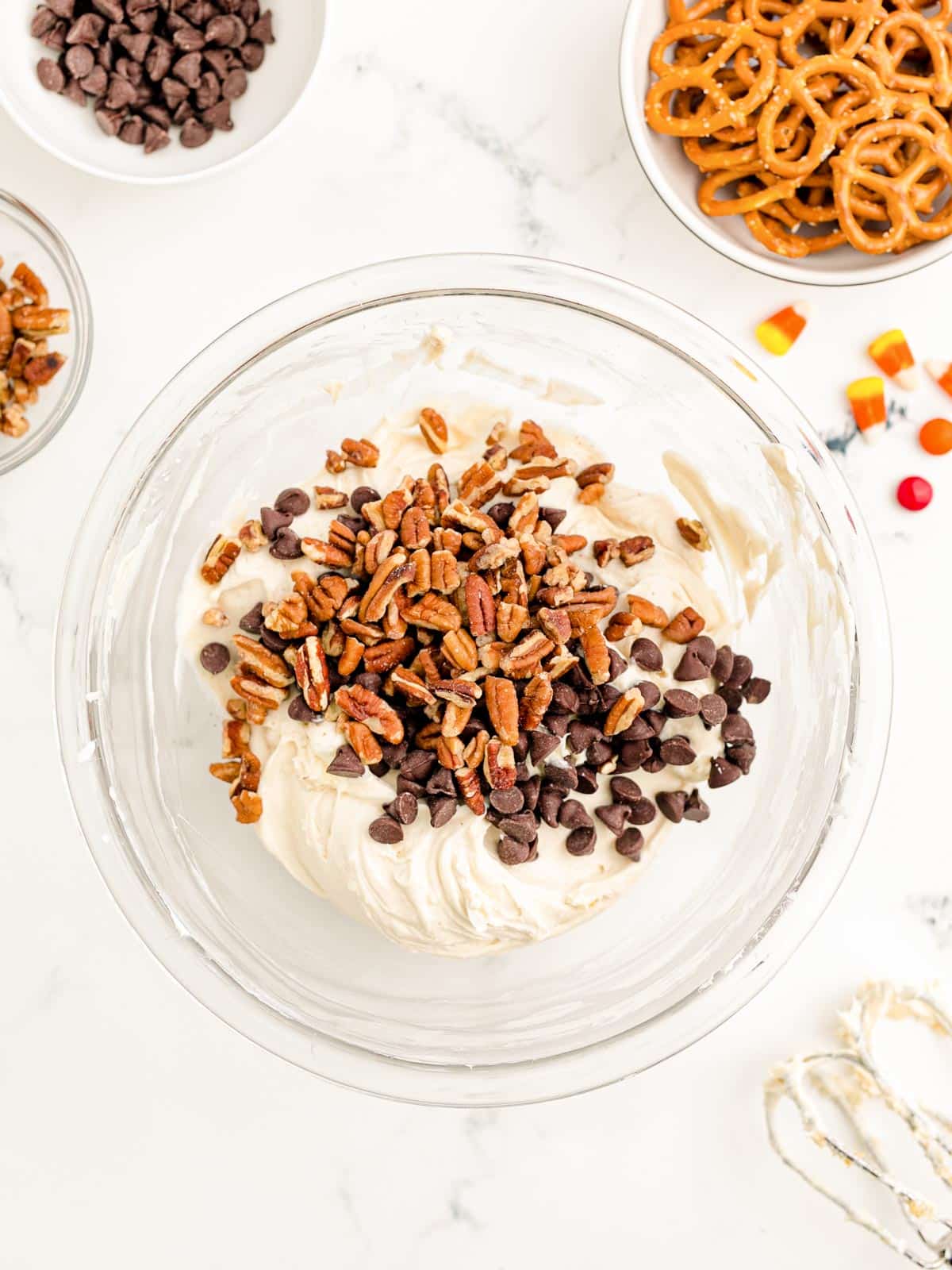 pecans and chocolate chips added to bowl.