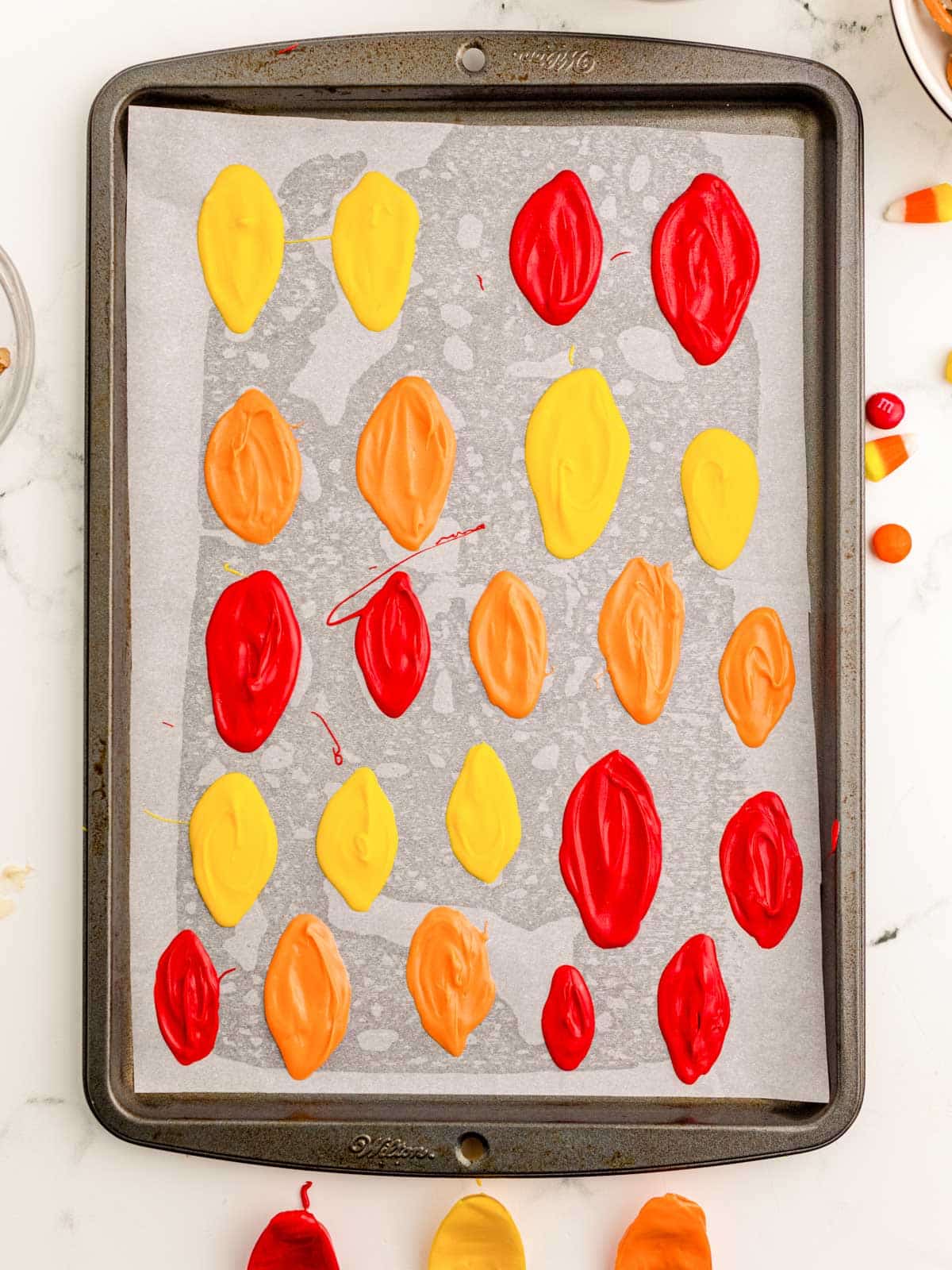 chocolate feathers on parchment paper.