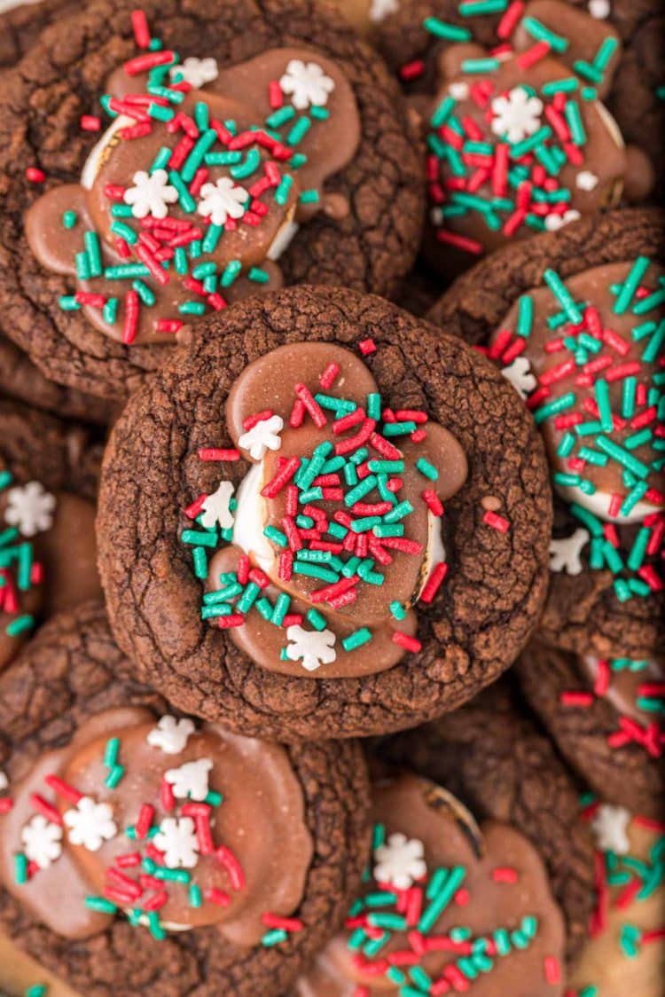 Overhead photo of hot chocolate cookies piled on top of each other.