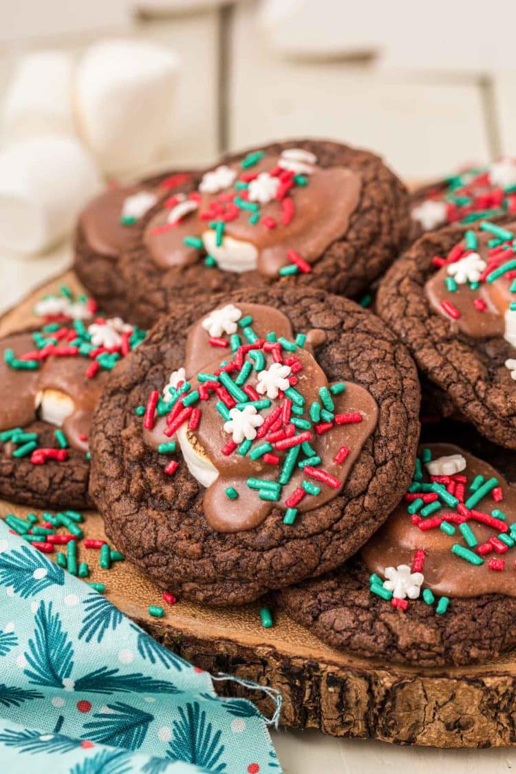 Hot chocolate cookies made from brownie mix on a wooden serving tray.