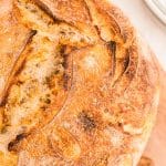 Overhead close up of a loaf of sourdough bread.