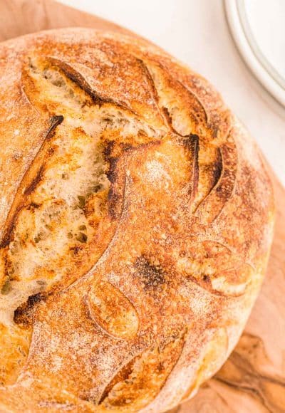 Overhead close up of a loaf of sourdough bread.