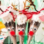 DIY Reindeer hot chocolate cones in an acrylic ice cream holder.