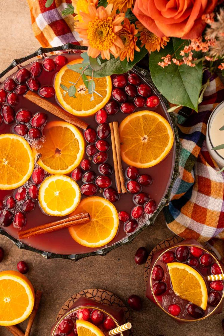 Overhead photo of a punch bowl filled with Thanksgiving punch.