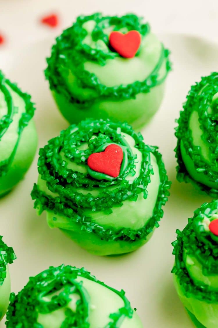 Close up photo of Grinch Cake Balls.