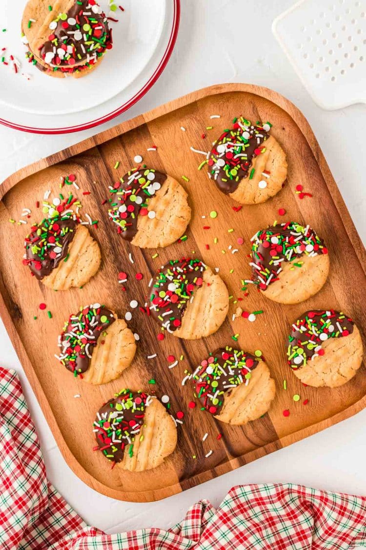 Peanut butter Christmas cookies on a wooden board.