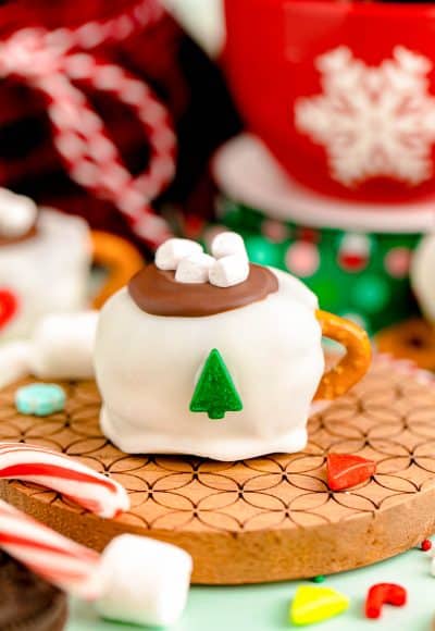 Hot Cocoa Oreo Ball on a wooden coaster.