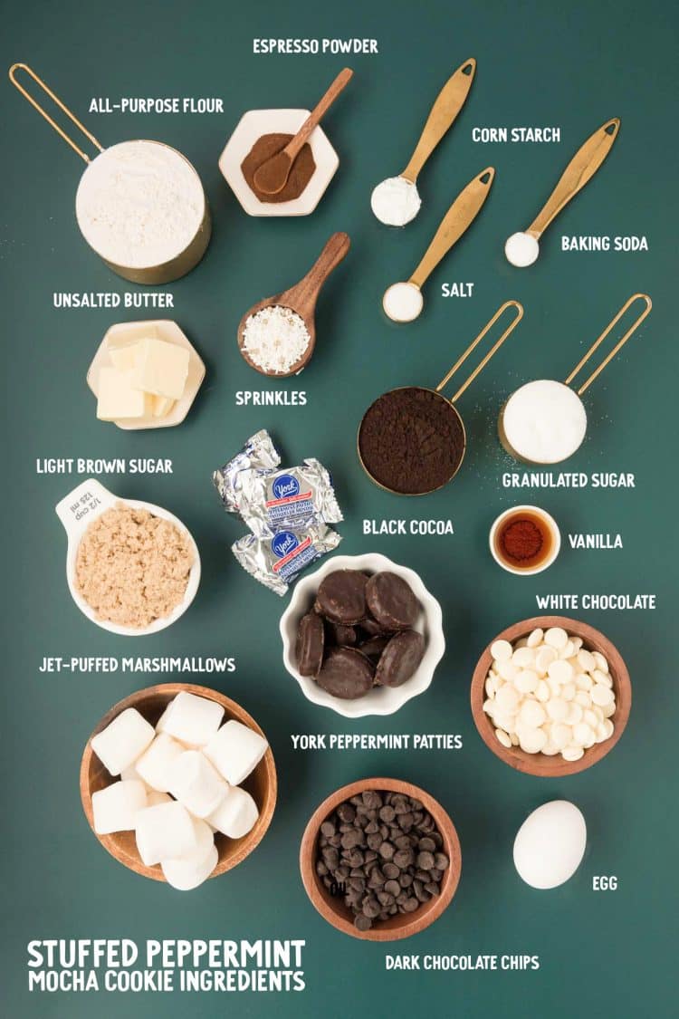 Ingredients to make peppermint mocha cookies on a green surface.