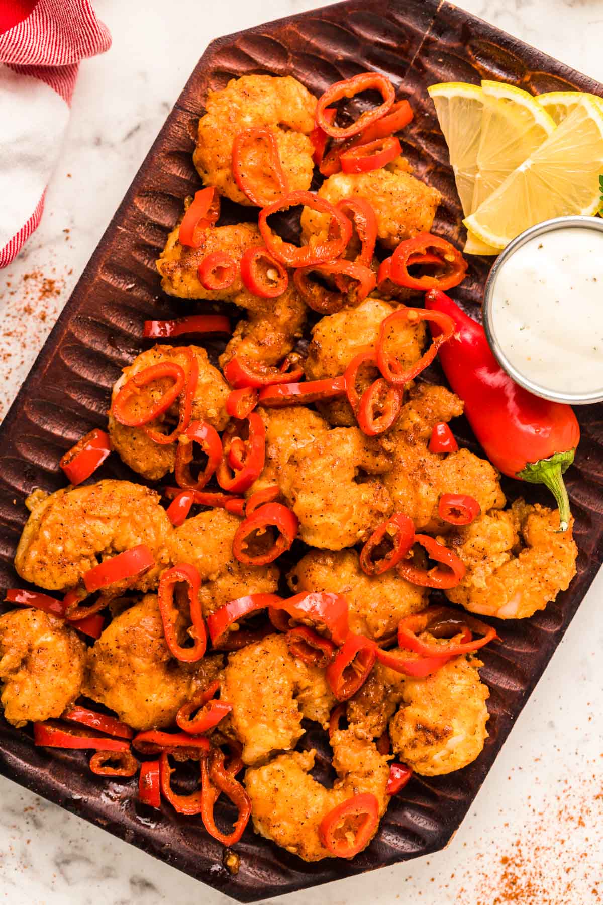 Overhead photo of Longhorn Wild West Shrimp copycat recipe on a wooden plate.