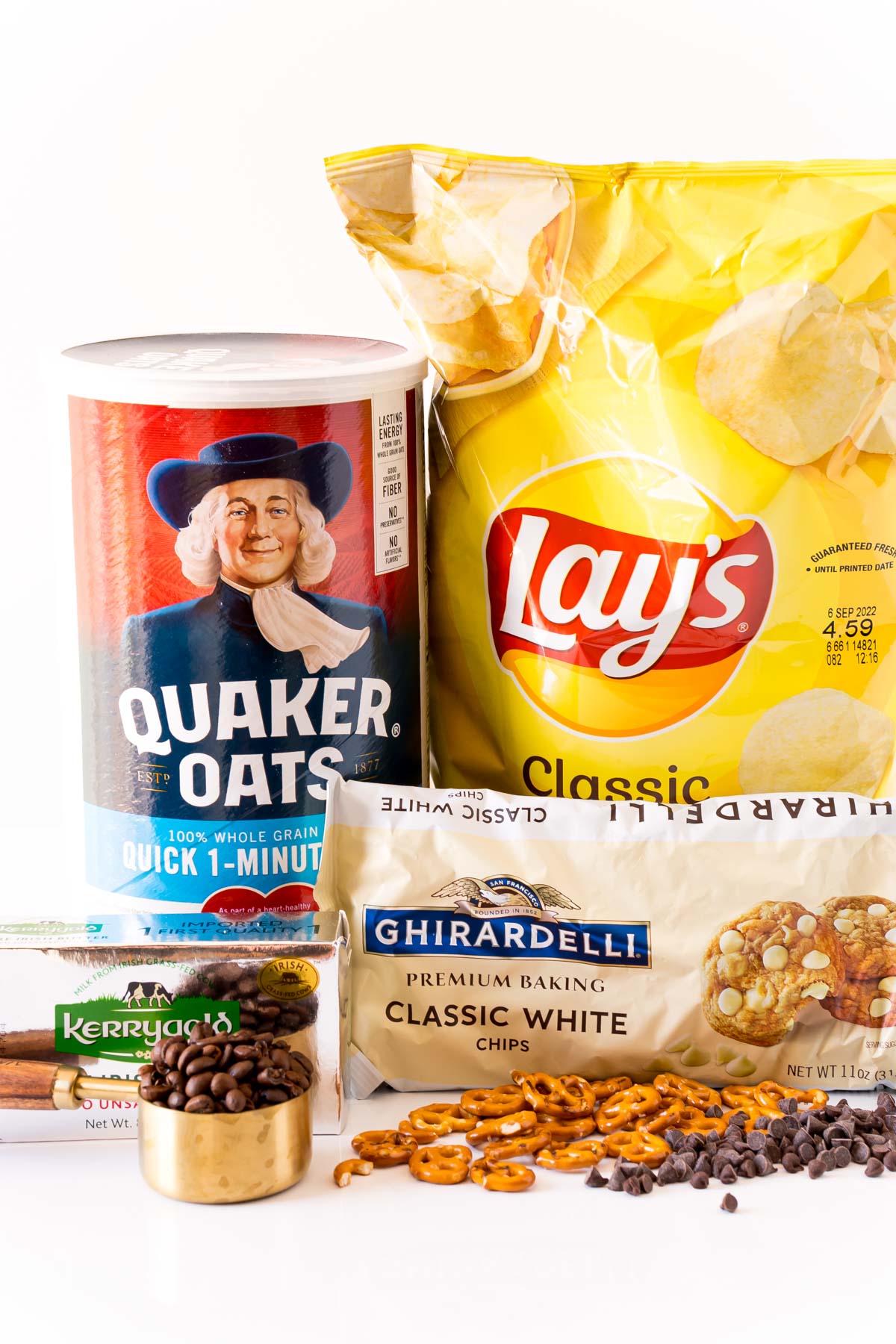 Key flavor ingredients to make compost cookies on a white counter.