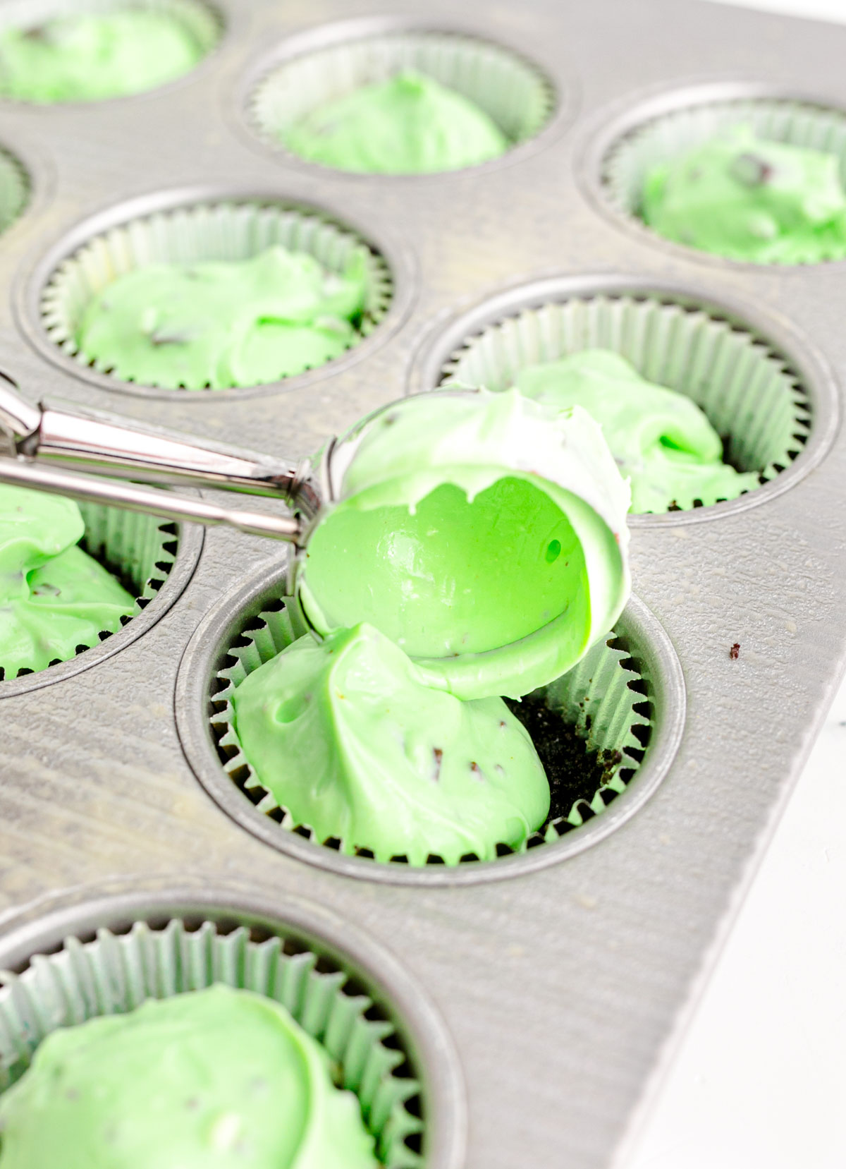 adding the mint cheesecake filling
