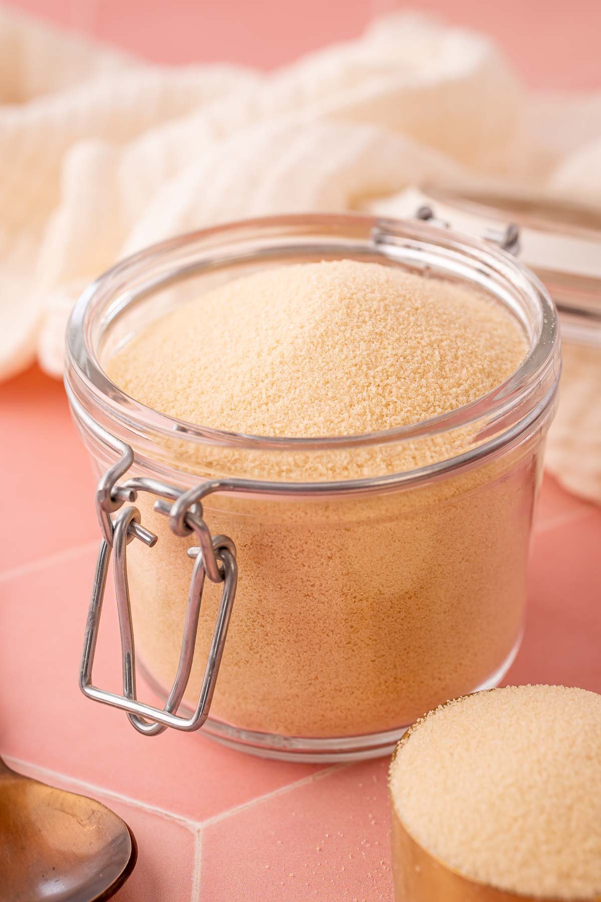Toasted sugar in a glass canister.