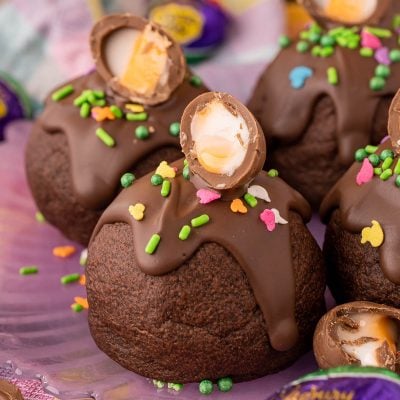 Cadbury Creme Egg Cookies on a purple plate.