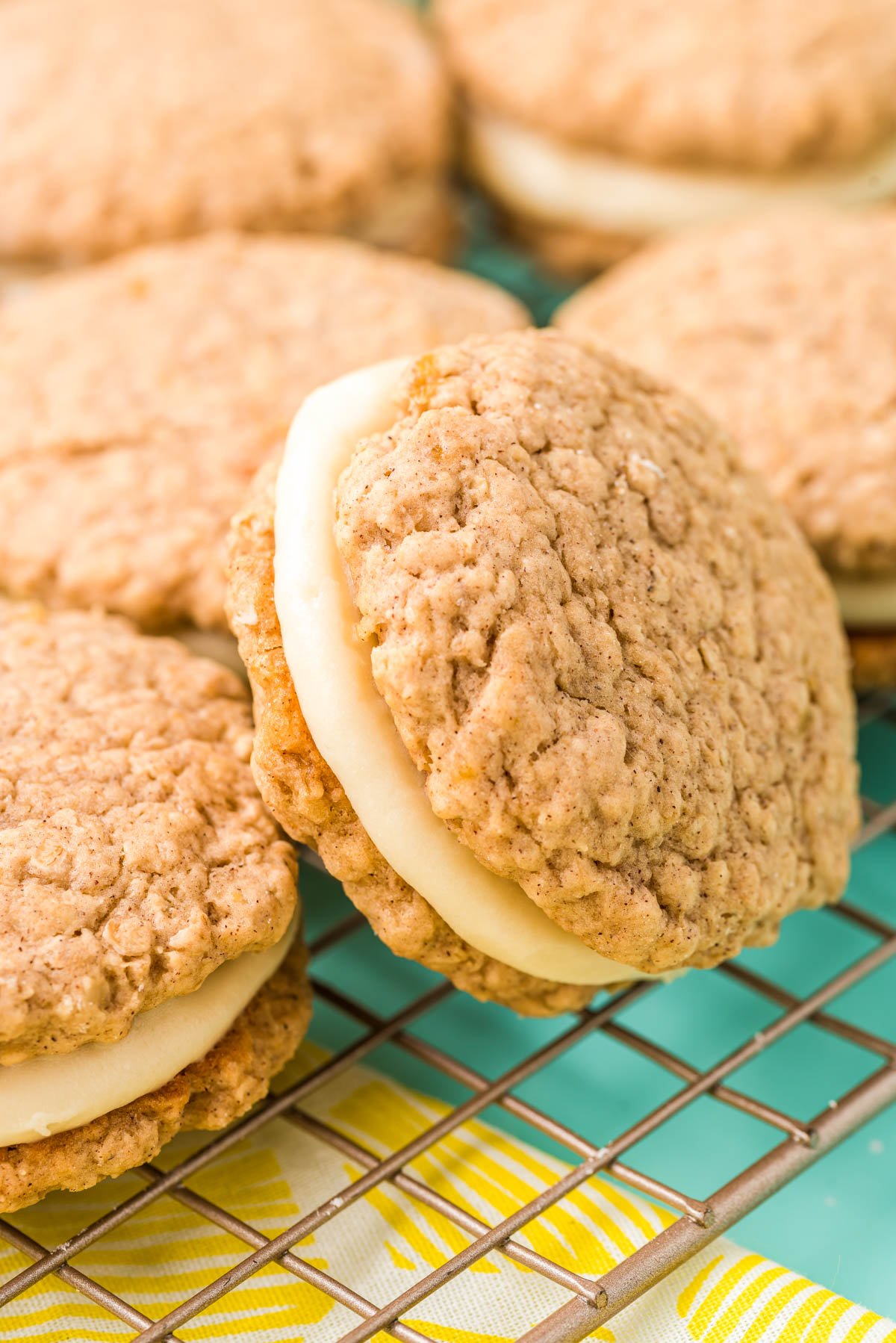 Close up of banana oatmeal cream pies on a wire rack.