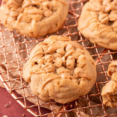 Bakery-Style Triple Peanut Butter Cookies on a copper wire rack.