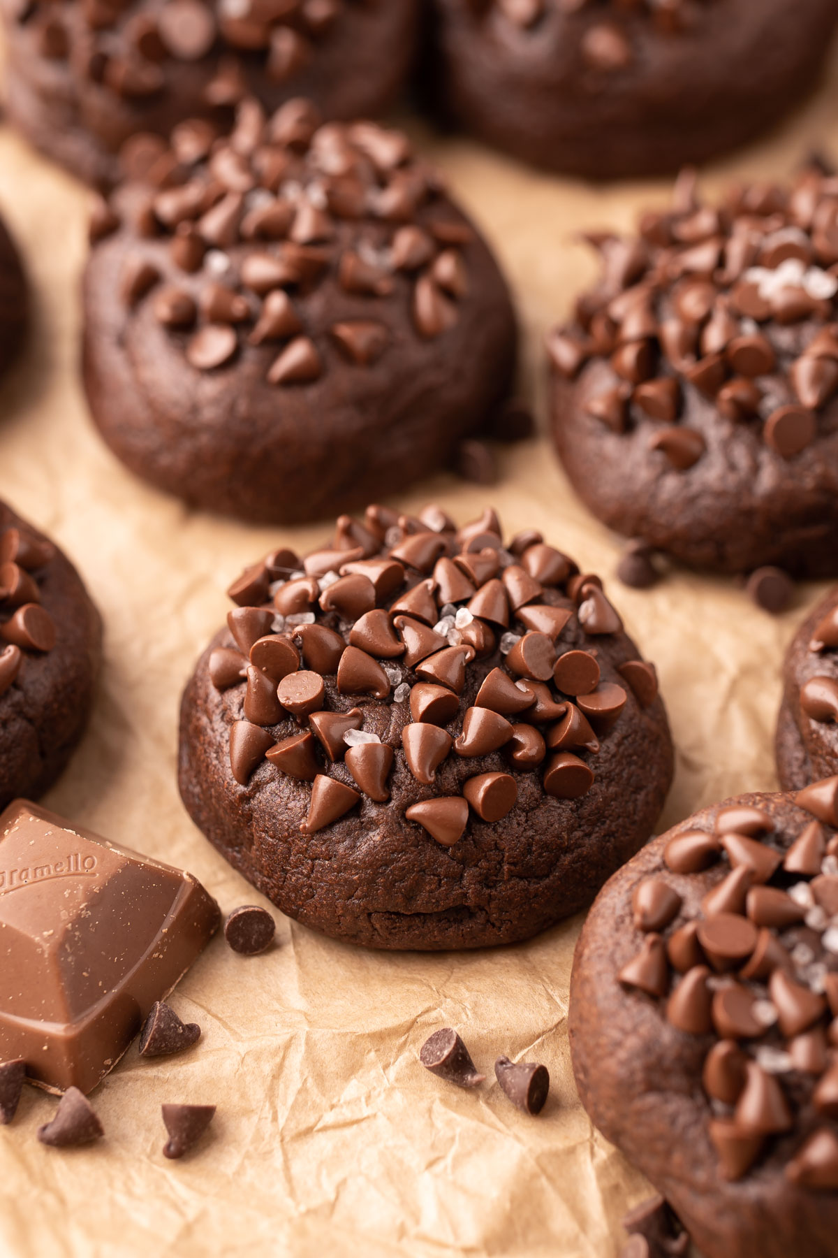 Salted Caramel Chocolate Cookies on parchment paper.