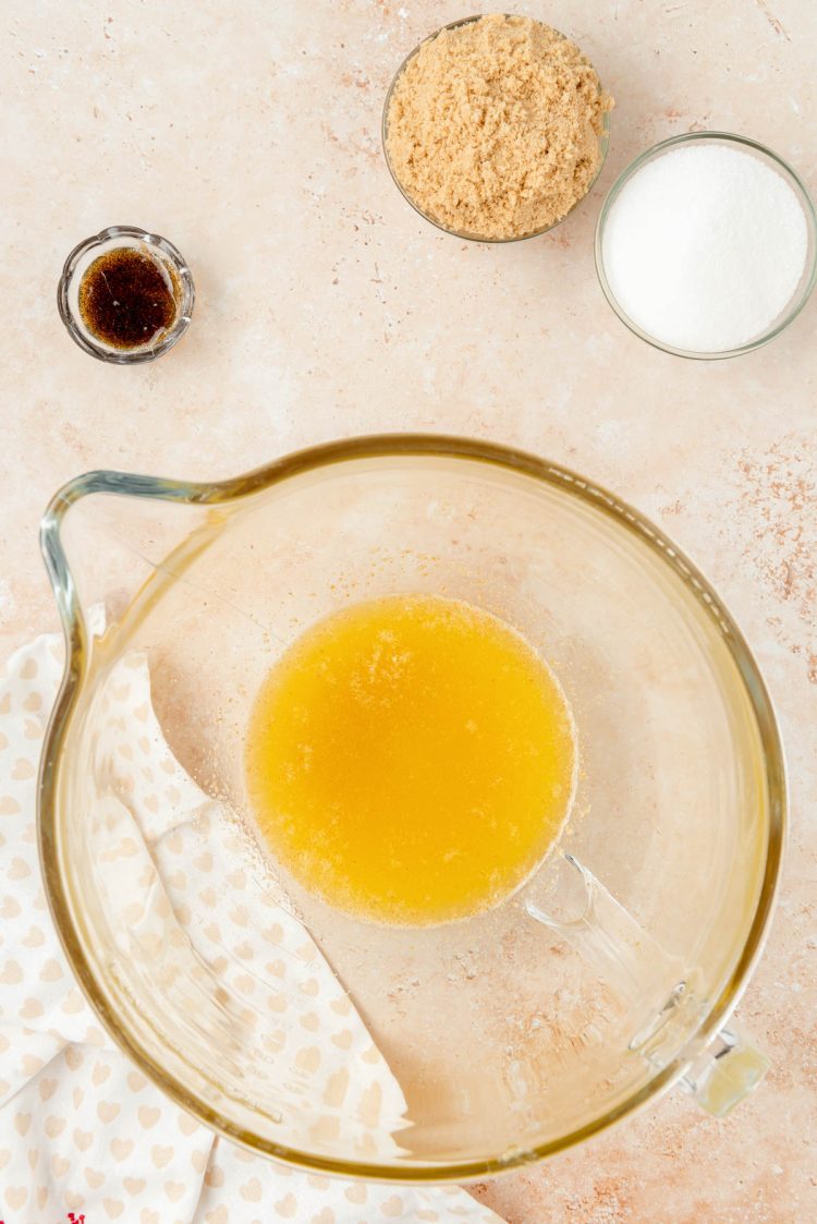 Browned butter in a glass mixing bowl.