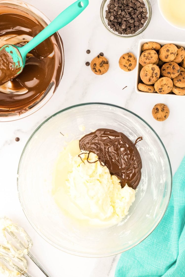 Melted chocolate and creamed butter in a mixing bowl.