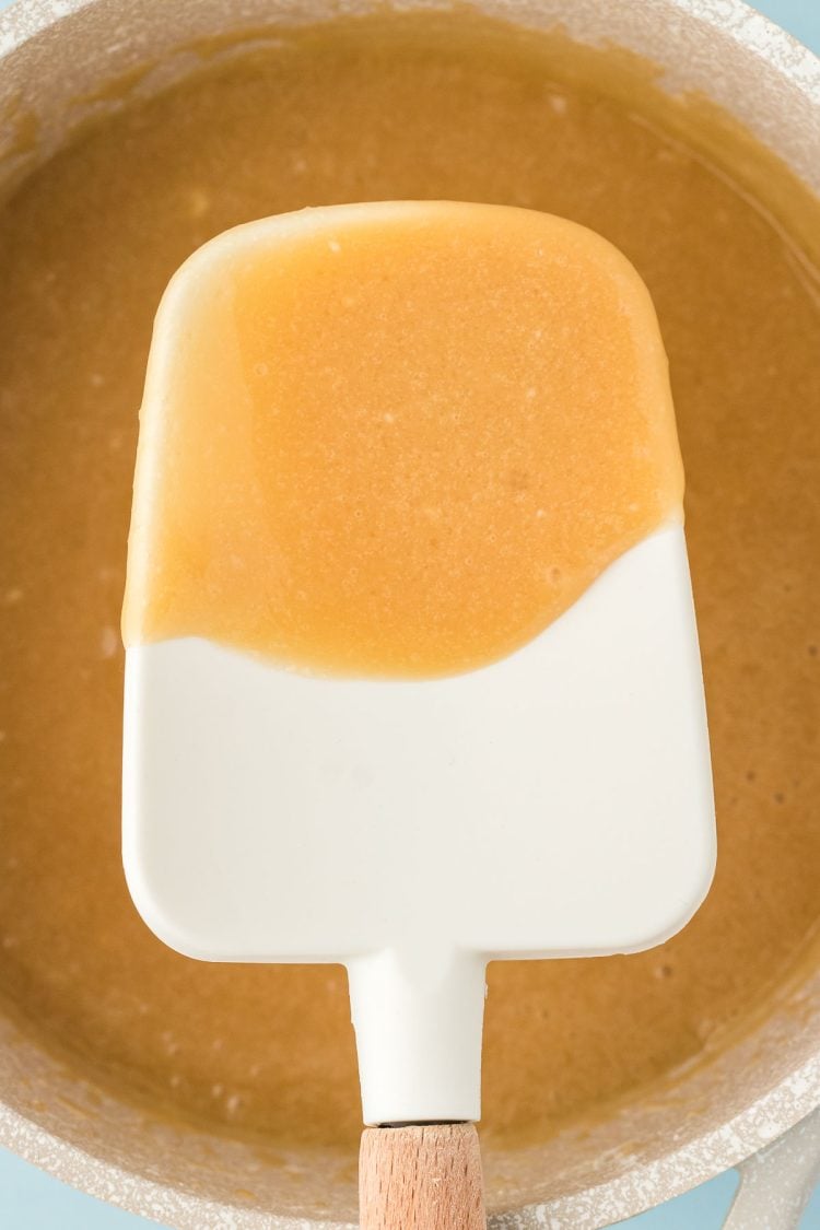 Brown sugar icing on a spatula.