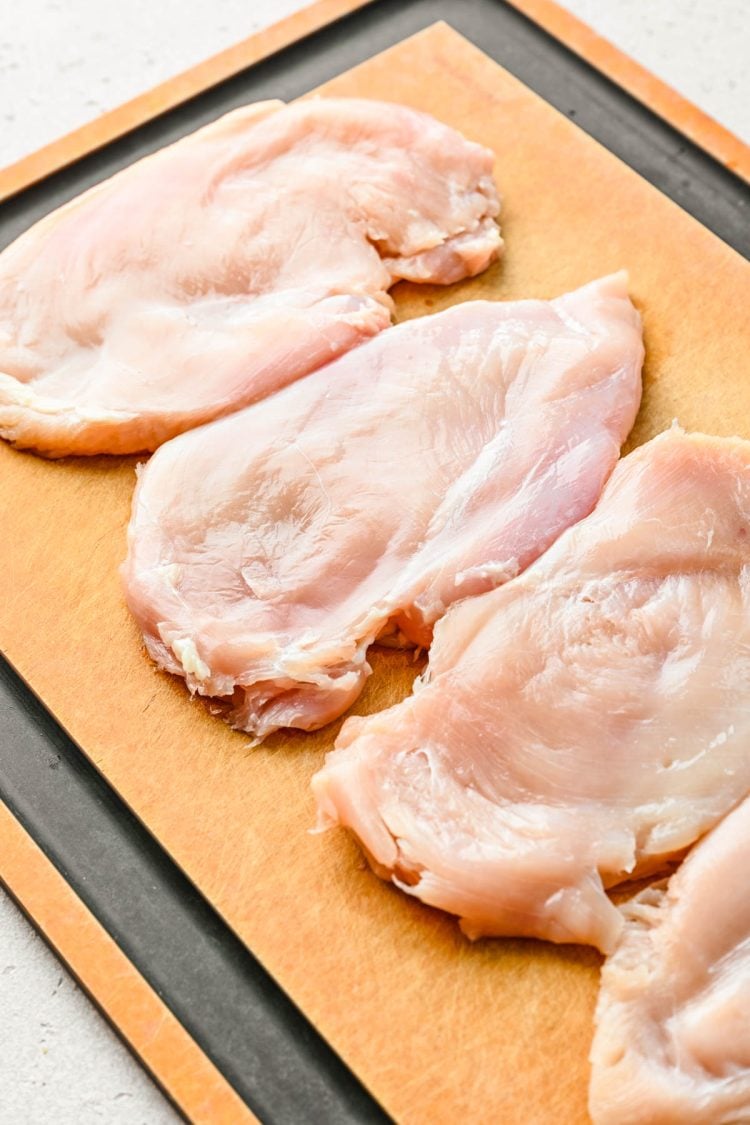 Chicken breasts have been pounded down into cutlets.