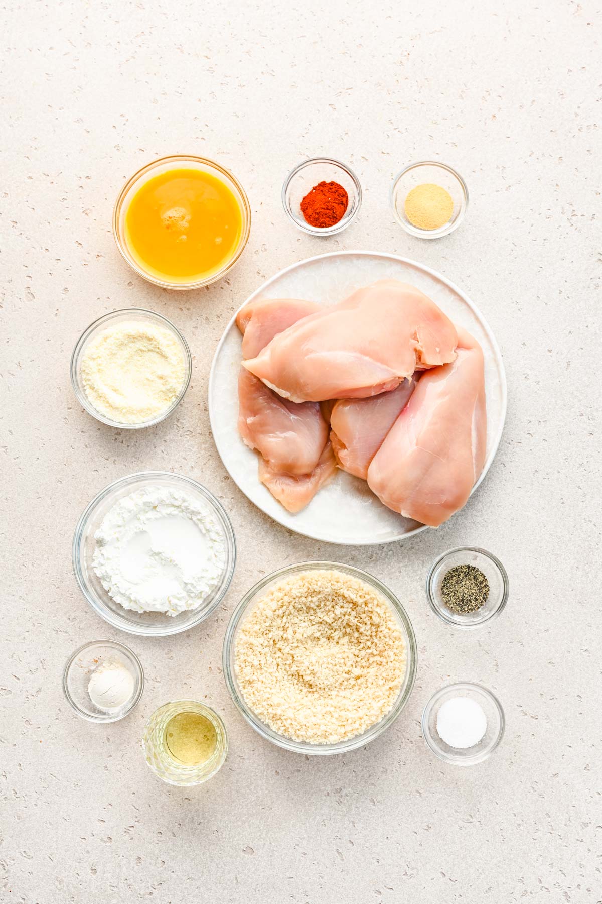 Overhead photo of ingredients to make panko chicken on a counter.