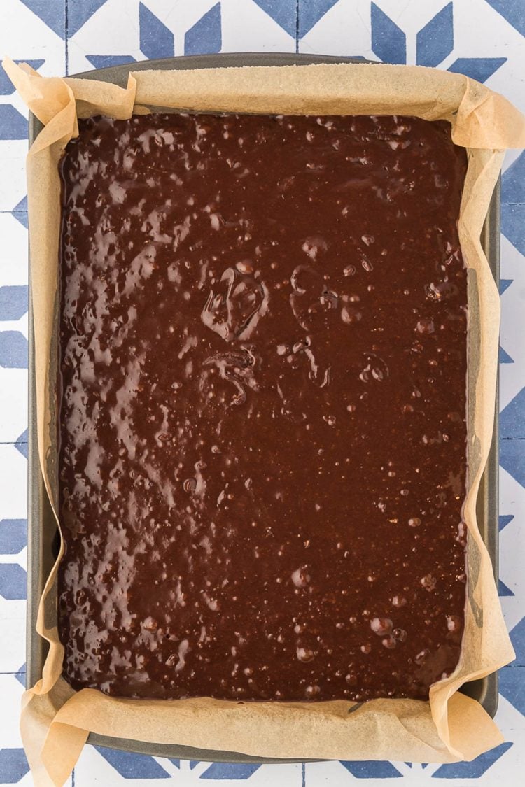 Brownie batter in a 9x13-inch pan. 