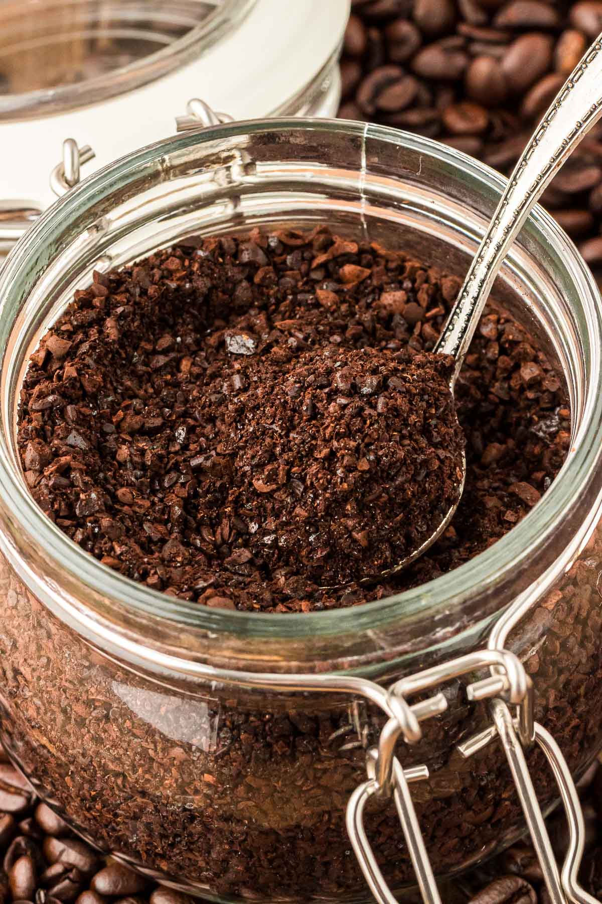 Coffee grounds in a glass jar.