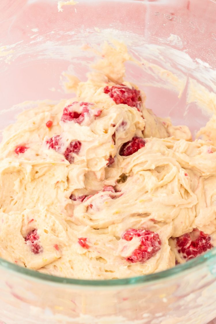 Raspberries folded into cake batter.