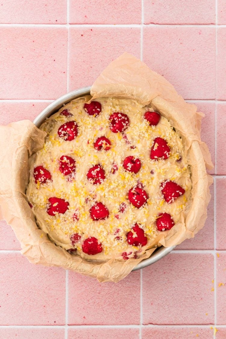 Lemon raspberry cake in a pan ready to be baked.