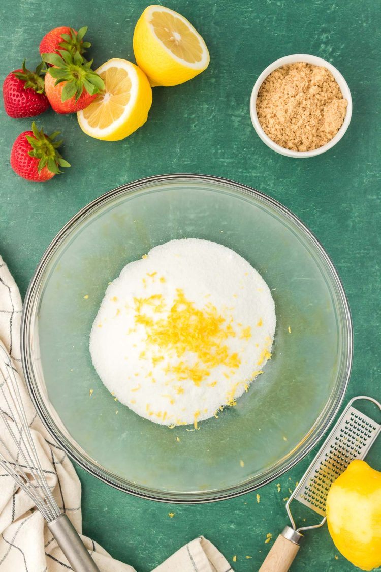 Lemon zest and sugar in a bowl. 