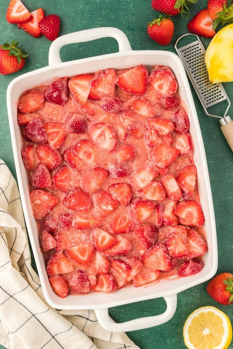 Overhead photo of a white baking dish with a strawberry mixture in it.