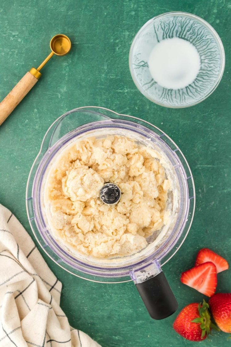 Biscuit cobbler topping in a food processor.