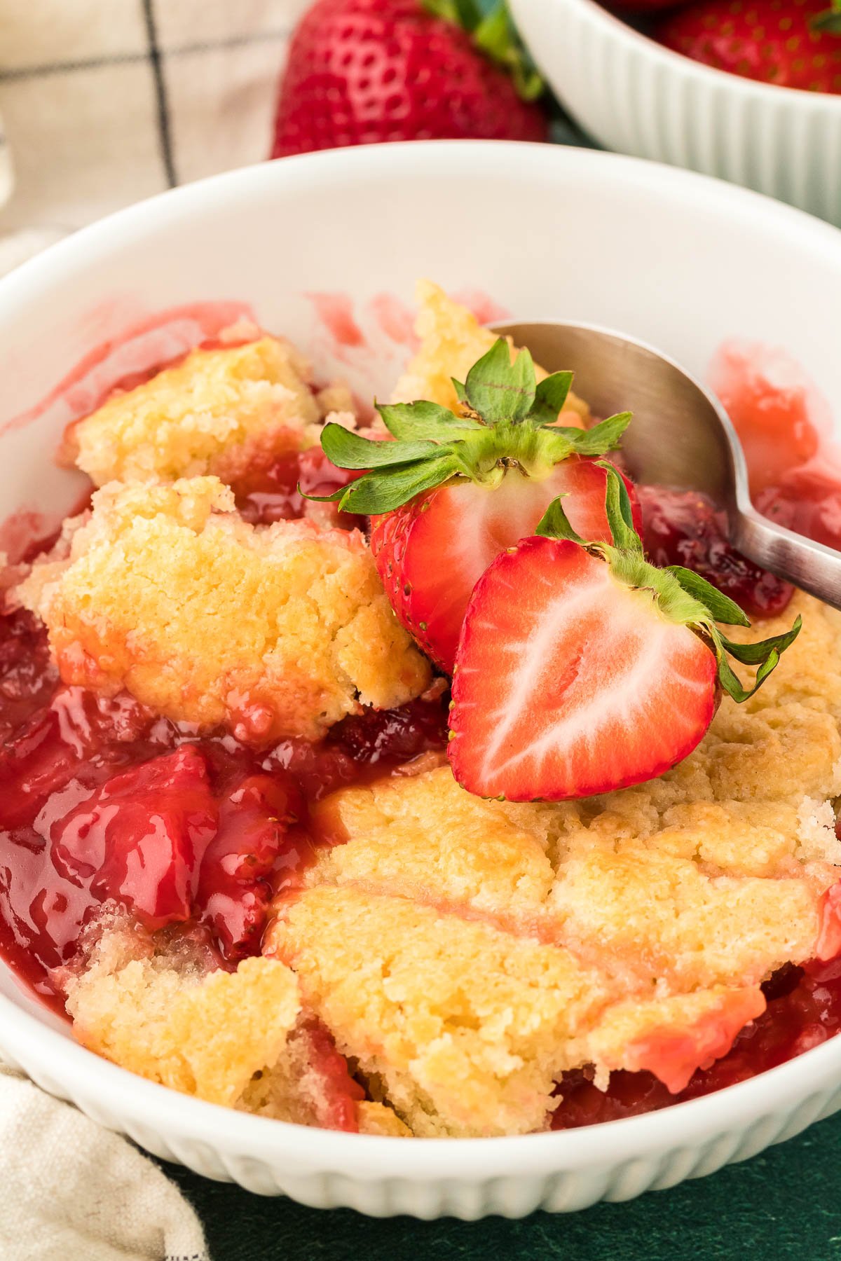 A bowl of strawberry cobbler.