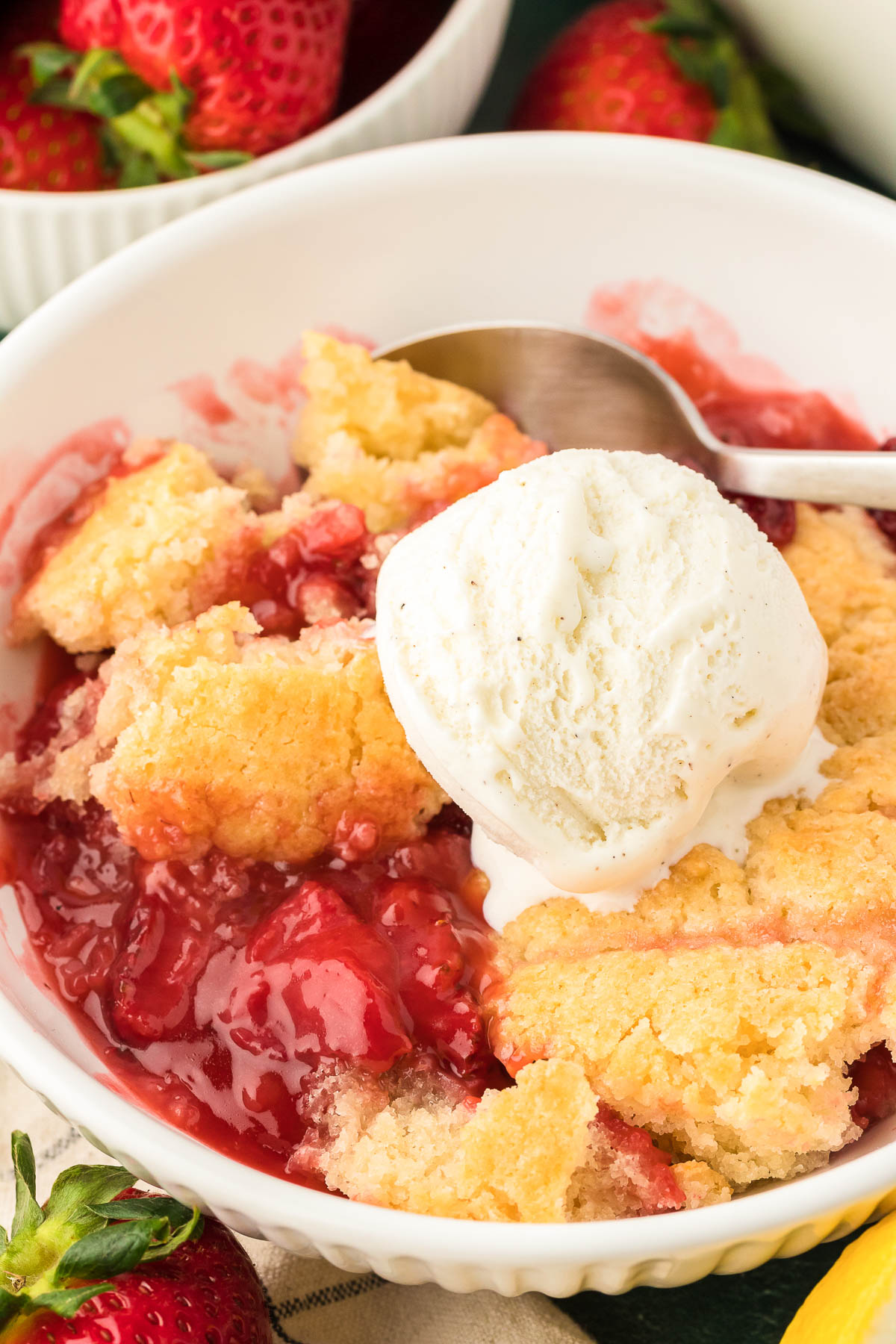 A bowl of strawberry cobbler.