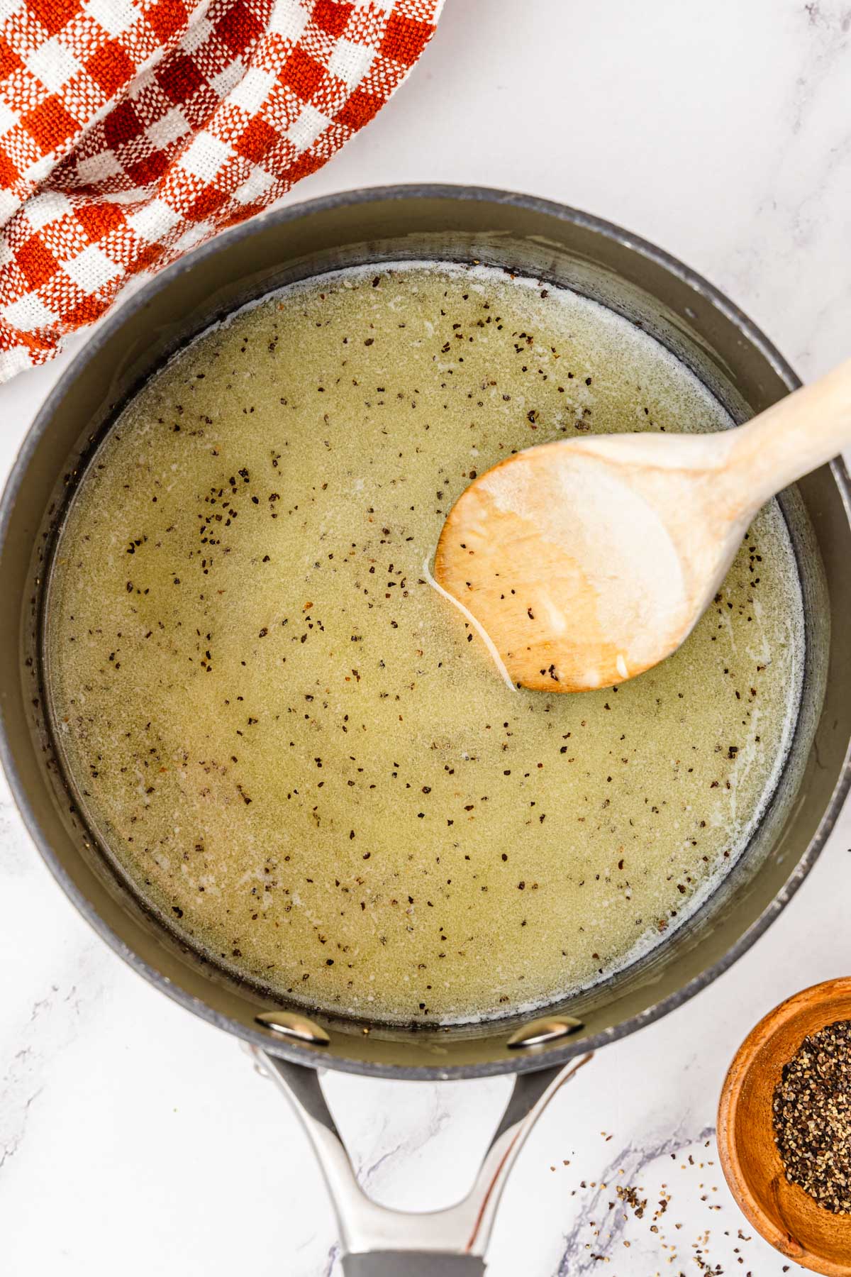 melted butter and black pepper in a saucepan to make gravy.