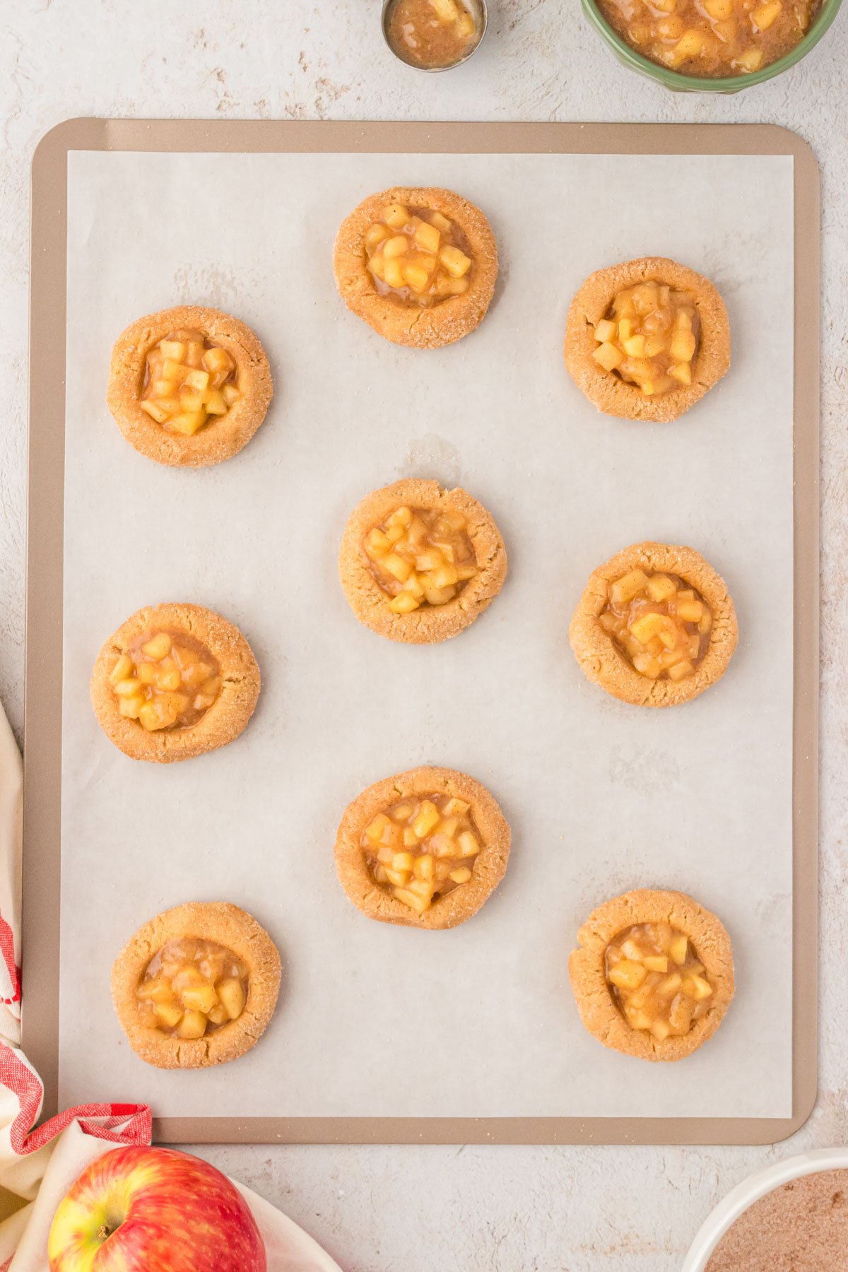 Overhead photo of apple pie cookies ready to be baked.