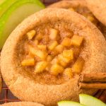 Apple pie cookies on a wire rack.